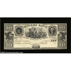 Pottsville, PA - Miners Bank $10 Proof Haxby UNLA tradesman is portrayed at the top center of this U