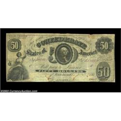 T8 $50 1861. This attractive note has a pair of typical circular COCs at the bottom that have been b
