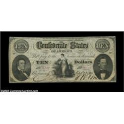 T25 $10 1861. This pretty note has ample margins and only a few light folds are present to limit the