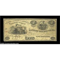 Charlotte, NC- The Bank of Mecklenburg $2 April 29, 1874A very rare example lacking the revenue stam