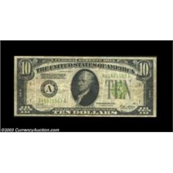 Fr. 2002-A $10 1928B Federal Reserve Note. Fine-Very Fine. A scarce early inverted reverse example.