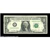 Image 1 : Fr. 1909-A $1 1977 Federal Reserve Note. About Uncirculated. A blank reverse example with one light