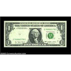 Fr. 1909-G $1 1977 Federal Reserve Note. Gem Crisp Uncirculated. The black overprint is nearly gone