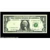 Image 1 : Fr. 1909-G $1 1977 Federal Reserve Note. Gem Crisp Uncirculated. The black overprint is nearly gone