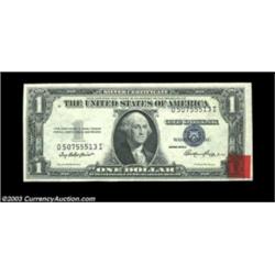 Fr. 1614 $1 1935E Silver Certificate. About Uncirculated. The third printing is shifted a bit high,