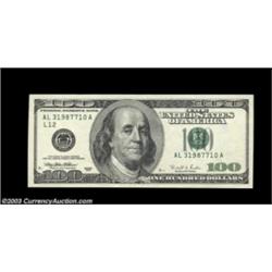 Fr. 2175-L $100 1996 Federal Reserve Note. About Uncirculated. The reverse is both printed at an ang