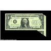 Image 1 : Fr. 1908-D $1 1974 Federal Reserve Note. About Uncirculated. A neat foldover error, with pieces of t