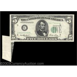 Fr. 1962-C $5 1950A Federal Reserve Note. Extremely Fine. A most interesting and dramatic error, wit