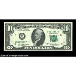 Fr. 2024-E* $10 1977A Federal Reserve Note. Extremely Fine. A star note error with multiple small in