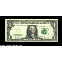 Fr. 1909-G $1 1977 Federal Reserve Note. Gem Crisp Uncirculated. A failure in the ink jet printer le