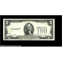 Fr. 1508 $2 1928G Legal Tender. About Uncirculated. A very high grade note which is missing the thir