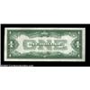 Image 2 : Fr. 1603 $1 1928C Silver Certificate. Choice Crisp Uncirculated.Gem centering, but held from the hig