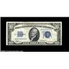 Image 1 : Fr. 1701* $10 1934 Silver Certificate. About Uncirculated.A couple of light vertical folds prevent a