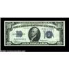 Image 1 : Fr. 1703 $10 1934B Silver Certificate. About Uncirculated.A bright high end example of this key to t