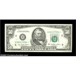 Fr. 2119-H* $50 1977 Federal Reserve Note. Choice Crisp Uncirculated.A nice star example which is ve