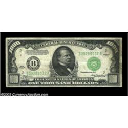 Fr. 2211-B $1000 1934 Federal Reserve Note. Very Fine+.An evenly circulated mid-grade example which