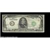 Image 1 : Fr. 2211-G $1000 1934 Federal Reserve Note. Very Fine.There is a bit of soil, especially on the reve