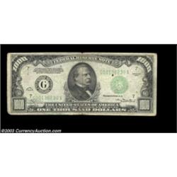 Fr. 2211-G $1000 1934 Federal Reserve Note. Fine.Problem free but for some writing in the back margi