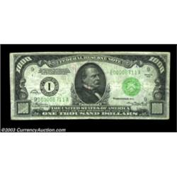 Fr. 2211-I $1,000 1934 Federal Reserve Note. Fine-Very Fine.A little wrinkled and with a small telle