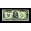 Image 1 : Fr. 2211-I $1,000 1934 Federal Reserve Note. Fine.A couple of teller stamps, including a heavy purpl
