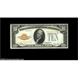 Fr. 2400 $10 1928 Gold Certificate. About Uncirculated.  Important notice: Heritage usually auctions