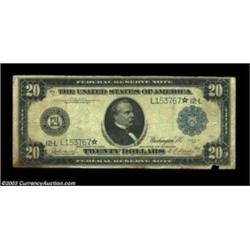 Fr. 1010 $20 1914 Federal Reserve Note Star Fine. About a half dozen pieces are known of this Star n