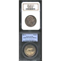 A pair of Talers including: