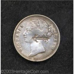 Indian Rupee 1840 counterstamped with a clove in which is PEMBA in Arabic.