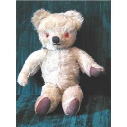 A small mohair teddy bear with articulated limbs (ILLUSTRATED)...