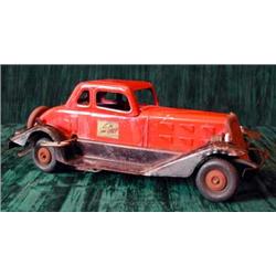 An American tinplate clockwork fire chief car, makers The Hoge MFG,Co.Inc, New York (ILLUSTRATED...