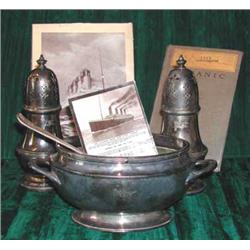 A collection of items of RMS Titanic interest including Rotary RP postcard of the Titanic with t...