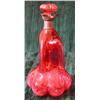 Image 1 : A silver mounted cranberry glass decanter of lobed form, height 28cm (ILLUSTRATED)...