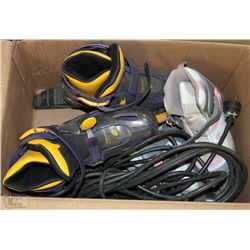 BOX OF ROLLER BLADES AND EXTENSION CORDS