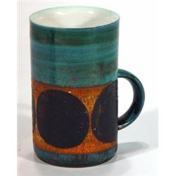 Troika mug hand painted with a panel of abs…