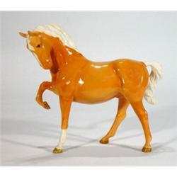 Hand painted Beswick tan horse with raised …