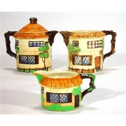 hand painted Beswick cottage teapot and cov…