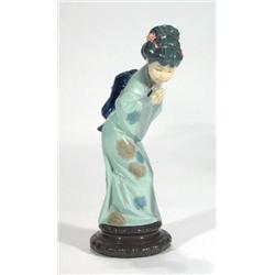 Hand painted Lladro oriental figurine in bl…