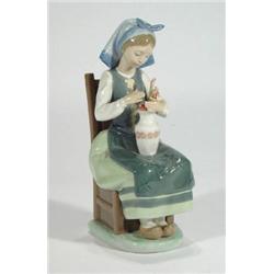 Hand painted seated Lladro figurine arrangi…