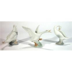 Two Lladro geese and a Nao goose, marks to …