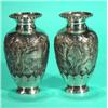 Image 1 : Pair of white metal vases, embossed with a …