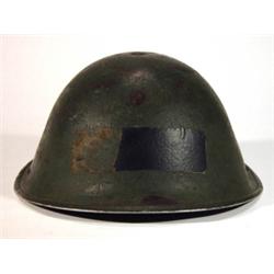 World War II military tin helmet…