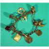 Image 1 : 9 ct gold charm bracelet with assorted char…