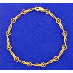 Unique Gold Acrobat Bracelet