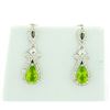 Image 1 : Elegant Peridot Dangle Earrings set in Sterling Silver