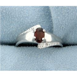 Garnet and Diamond Ring in Platinum over Sterling Silver