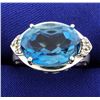 Image 1 : 10 Carat Blue Topaz and Diamond Ring in White Gold