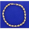 Image 1 : 6 7/8 inch Gold Designer Bracelet