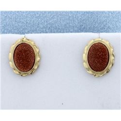 Goldstone Bezel Set into 14K Gold Earrings