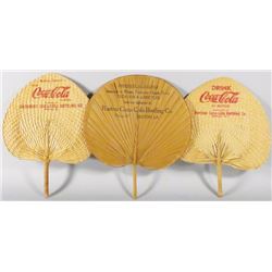 Three Coca Cola Advertising Fans