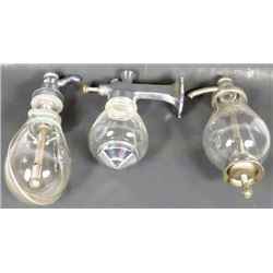 Three Glass Soap Dispensers